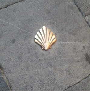 The emblem for the Camino de Santiago is a shell (long story!). This brass shell is embedded in a paving stone in a plaza in Jaca.